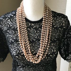 Faux pearl necklaces